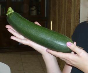 zucchini in hands