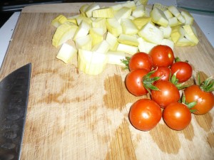 chopped yellow squash and cherry tomatoes