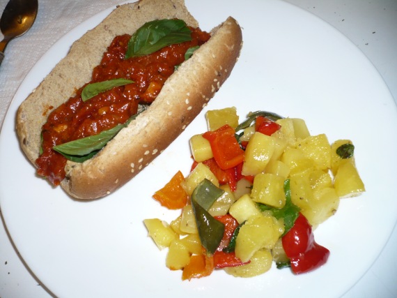 roasted pumpkin and peppers on the side of italian sausage