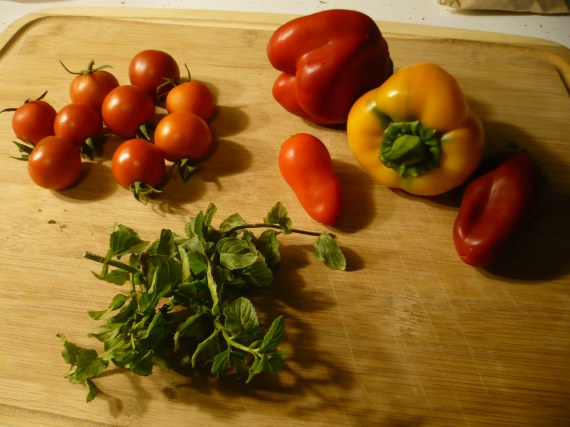 Tomatoes, peppers, and peppermint from the garden